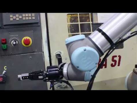 UR10 WITH DUAL 2F-85 ROBOTIQ GRIPPERS MACHINE TENDING CNC LATHE - Automation - YouTube