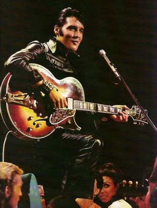 Elvis Presley Playing Guitar