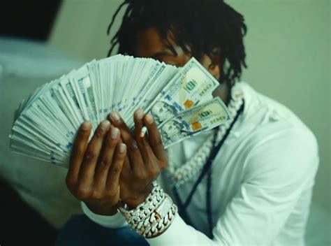 Rappers Holding Money