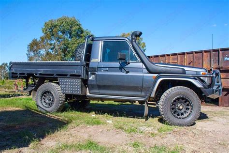 Right side view of a Grey 79 Series Single Cab Toyota Landcruiser at Superior Engineering fitted ...