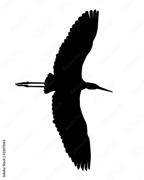 Black silhouette of a flying heron Stock Vector | Adobe Stock