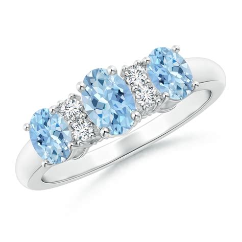 Oval Three Stone Aquamarine Engagement Ring with Diamonds | Angara