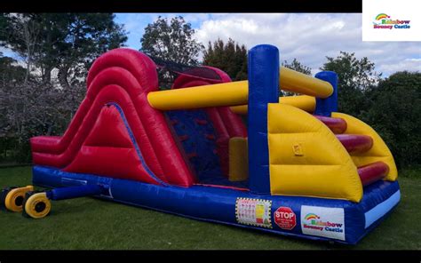 Rainbow Bouncy Castle - Bouncy Castle Rental For Birthdays