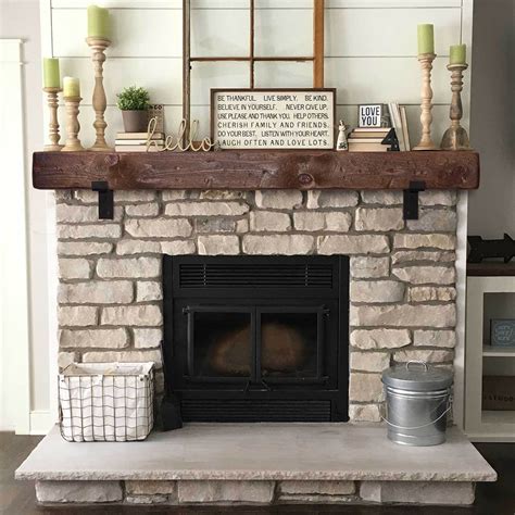 Unique Barn Beam Mantle with Black Metal Brackets — Homebnc