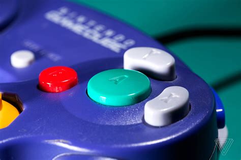 The GameCube controller’s A button subtly taught us how to play - The Verge