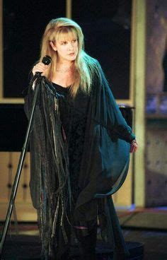 beautiful Stevie onstage ~ ☆♥ ♥☆ ~wearing an elaborate black dress and shawl when she performed ...