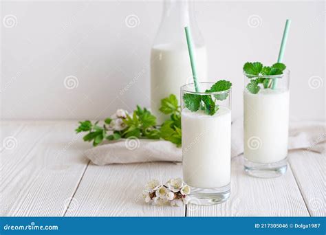 Fresh Fermented Milk Chilled Drink Lassi in Two Glasses on a White ...