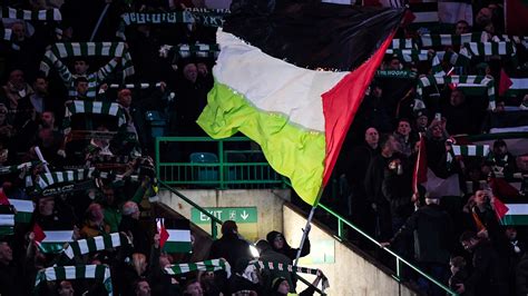 Celtic fans defy club's orders as Palestine flags spotted in stands for ...