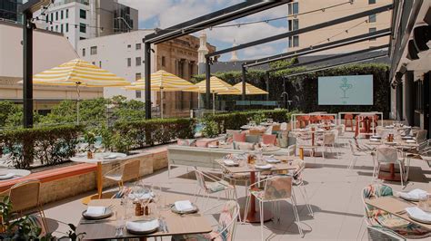 Hyatt Regency Brisbane Has Turned Its Rooftop Pool Terrace Into a Retro ...