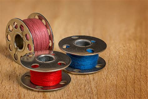 Do Bobbins Need to be Replaced? (What You Should Know!) - Gathering Thread