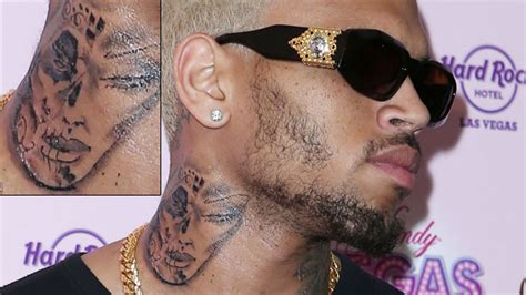 This3buttor: CHRIS BROWN TATTOOED RIHANA 'S FACE ON IS NECK