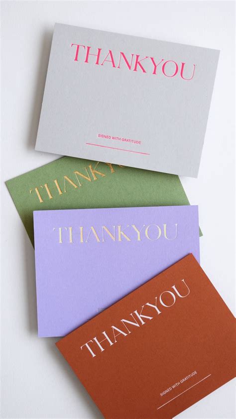 three thank you cards sitting on top of each other