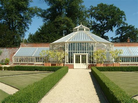 A large greenhouse with a feature double height hexagonal central ...