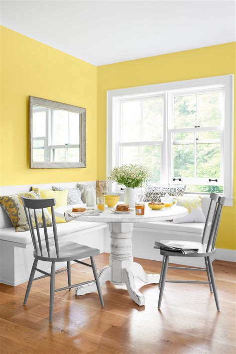These Warm Paint Color Ideas Will Make Your Home Feel Extra Cozy | Yellow dining room, Warm ...