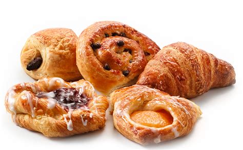 Breakfast pastries - croissants, pan au chocolats, pan au raisins, danish fruit and custard ...