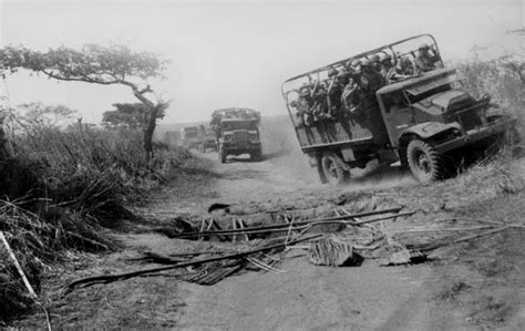 A Portuguese Army convoy dodges a trap on the road, during Portuguese Colonial War. Mozambique ...