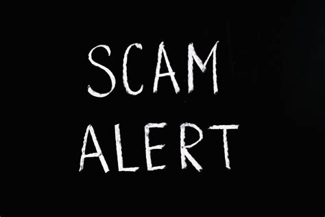 Scam Alert Letting Text on Black Background · Free Stock Photo