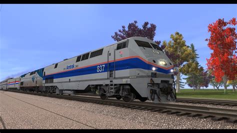 Amtrak Phase IV "Heritage" P40DC #837 leads #14 - YouTube