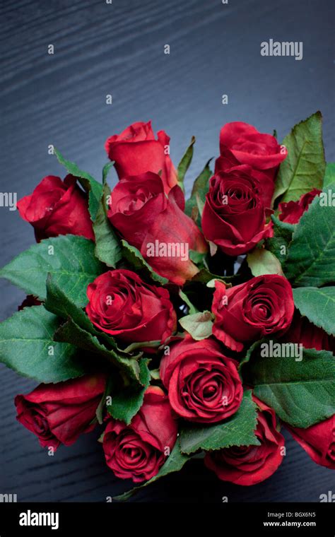 bouquet of red silk roses Stock Photo - Alamy