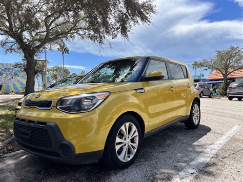 The Story Behind Gulfport's Yellow Kia Soul