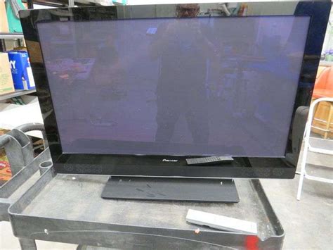 42" Pioneer plasma TV with remote. Powers up. - AAA Auction and Realty