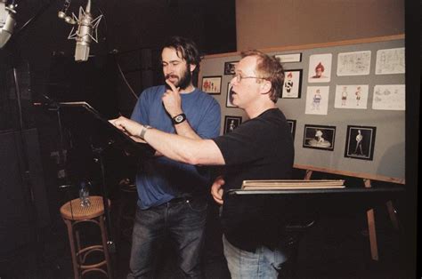 Jason Lee, the voice of Syndrome, with Brad Bird.