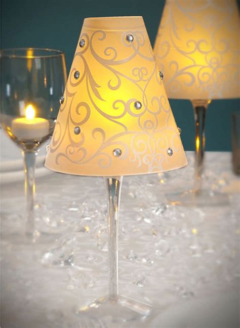 Candles and little diamonds for a touch. | Wine glass lamp, Candle table decorations, Led tea lights