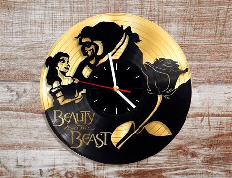 Beauty and the beast vinyl wall clock. Gold record.