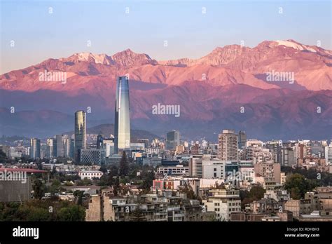 Aaerial view of Santiago skyline at sunset with Costanera skyscraper ...