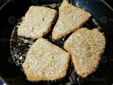 breaded wiener schnitzel with side dishes 24056327 Stock Photo at Vecteezy