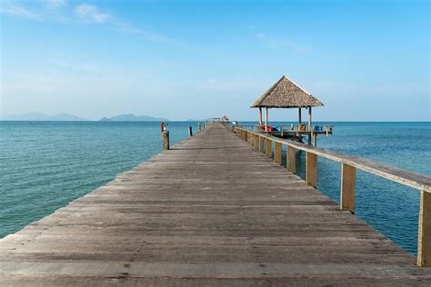 Wooden Pier Between Sunset In Phuket Photograph by Prasit Rodphan - Fine Art America