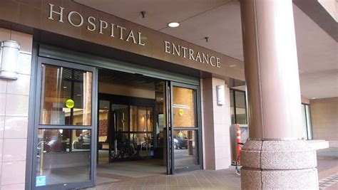 PORTLAND, OREGON - CIRCA 2012: Hospital Entrance With Patients Entering And Exiting Through ...