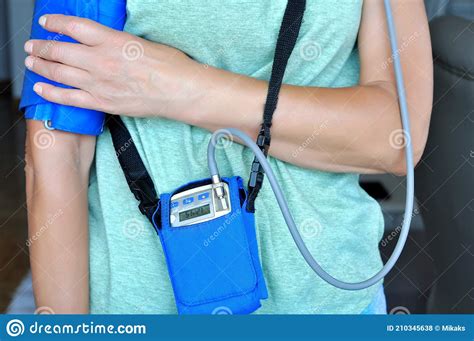 Woman Wearing Holter Monitor Device for daily Monitoring of an ...