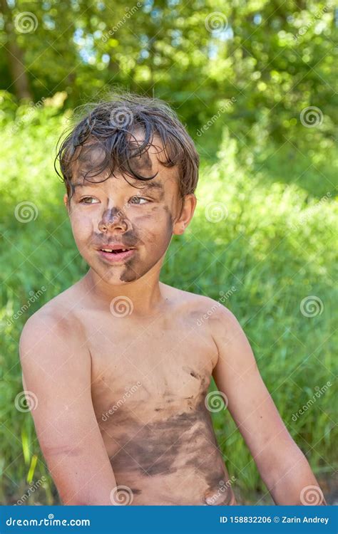 The Child Smeared the Face, Hands and Body in the Mud Stock Photo - Image of lifestyle, dirty ...