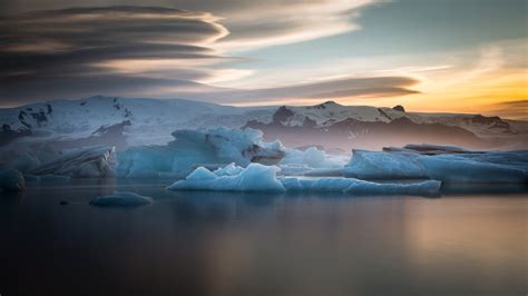 Stunning Icebergs: A Nature-Inspired HD Wallpaper by Clement127