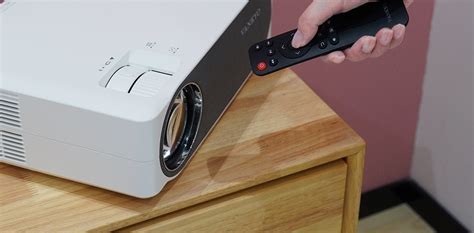 How to pair the projector remote control? | TVsBook