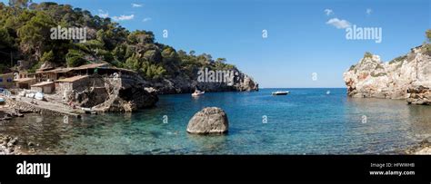 Deia, Mallorca, Spain. the beach known as Cala Deia with beachside restaurant famous in the TV ...