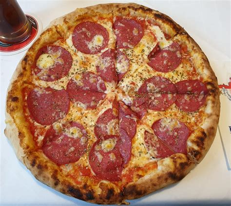 Salami Pizza from my local croatian restaurant. Delicious. : r/Pizza