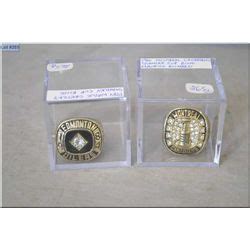 Two replica championship rings including 1984 Wayne Gretzky Stanley Cup ...