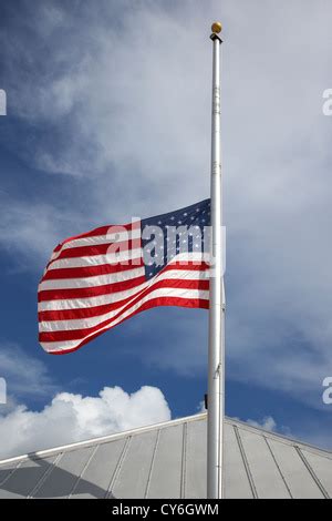 The American flag flying at half mast over the US Embassy in Berlin ...