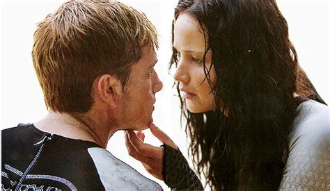 Peeta & Katniss (Beach scene) - Catching Fire Photo (36044365) - Fanpop