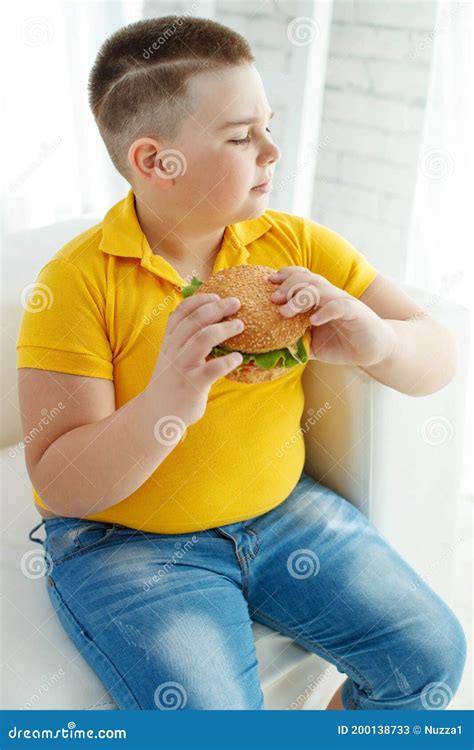 A Boy with Metabolic Disorders. Child with the Problem of Childhood Obesity. Overweight Obese ...