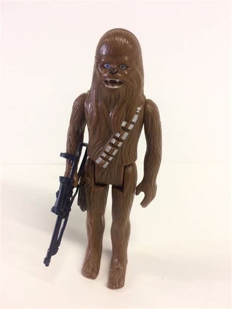 ORIGINAL 1970'S STAR WARS ACTION FIGURE WITH WEAPON CHEWBACCA