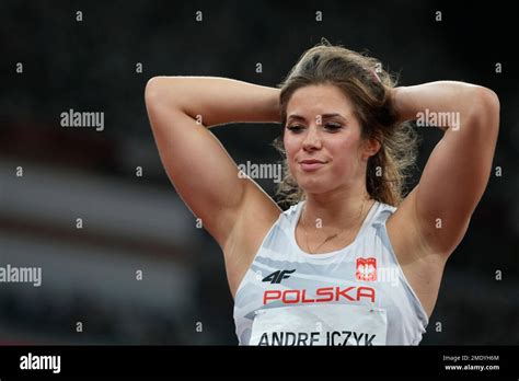 Maria Andrejczyk, of Poland, reacts after winning the silver medal in ...