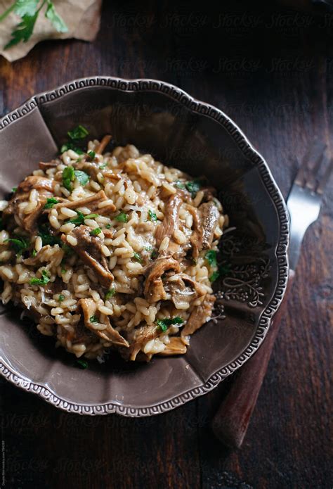 "Mushroom Risotto" by Stocksy Contributor "Davide Illini" - Stocksy