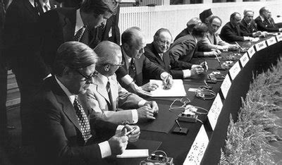 President Ford signing the Helsinki Accords on August 1, 1975.