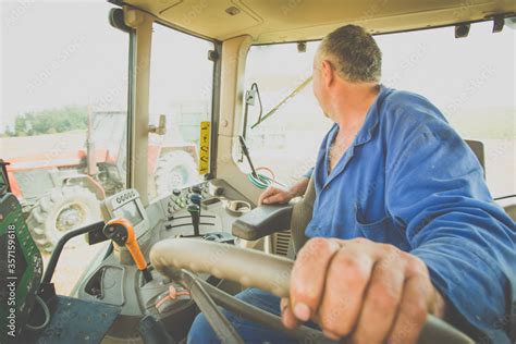 Tractor working on the farm, modern agricultural transport, farmer ...