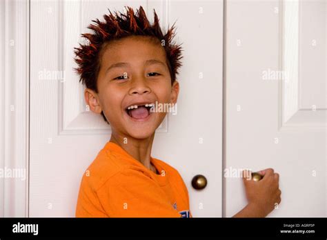 Young Asian boy with spiked hair Stock Photo - Alamy