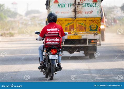 Zomato Bike Rider Delivery Boy Looking At Rider From Swiggy Food Tech Starup Apps Showing ...