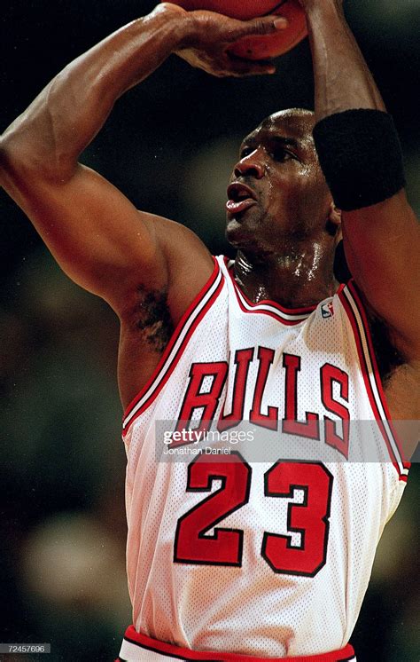 Chicago bulls michael jordan stuffs the basketball through the – Artofit